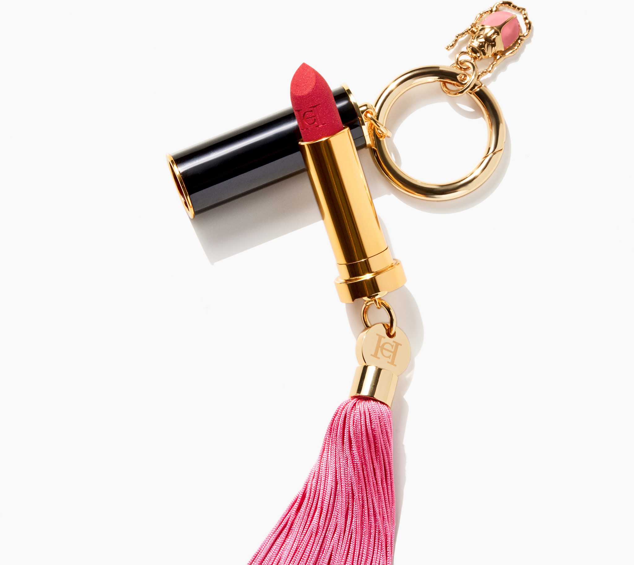 LIPSTICK MIT TESSLE UND CHARM AUS DER HERRERA BEAUTY KOLLEKTION I © Carolina Herrera